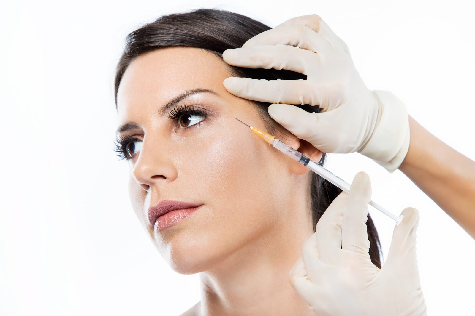 Young woman receiving Glutathione injection for skin rejuvenation and anti-aging benefits.